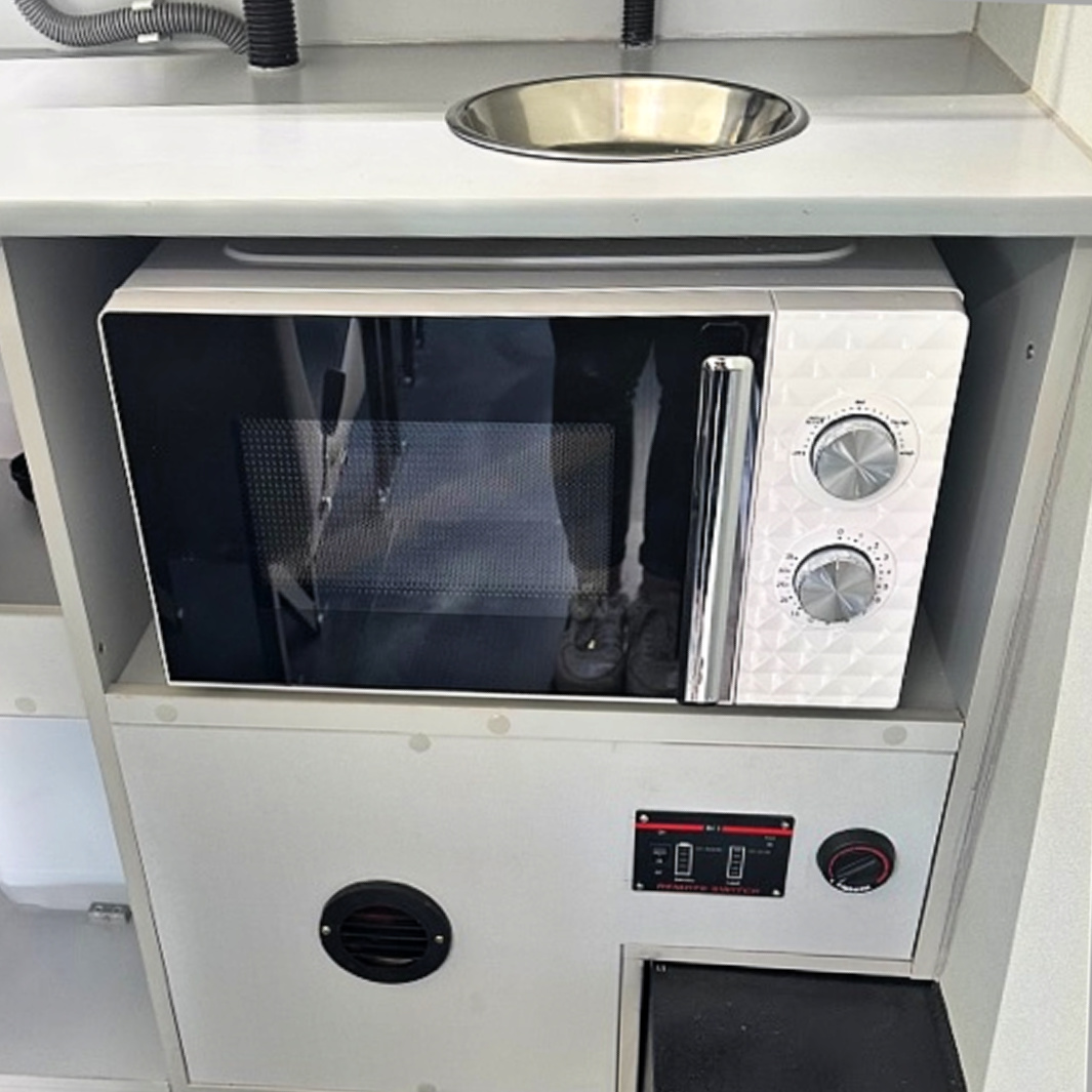Renault Master Microwave Oven, Power Inverter and Split Charge Relay Welfare Vehicle Conversions